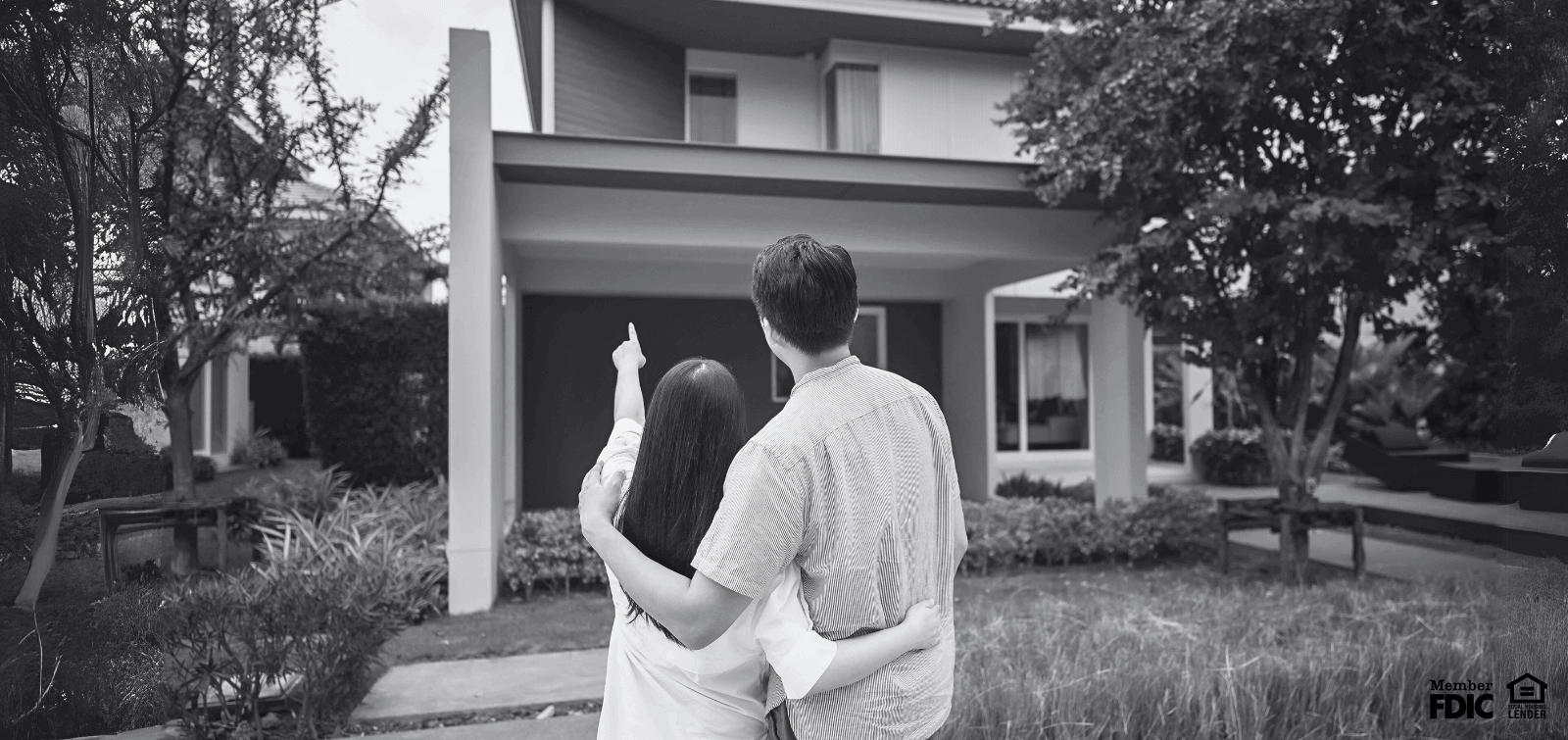 A young couple views homes while looking for new house.