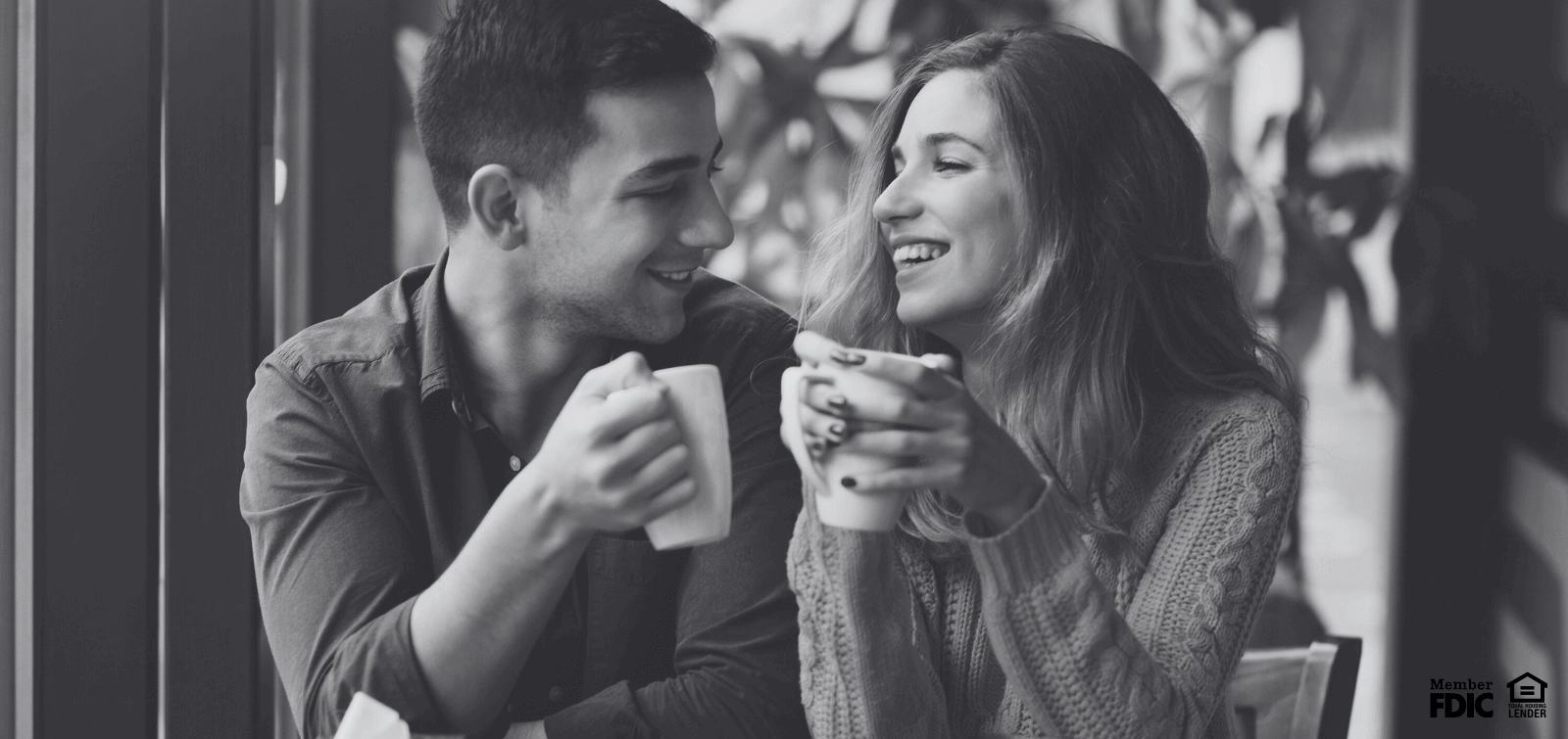 a man and woman drink coffee together while out